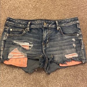 Distressed denim shorts